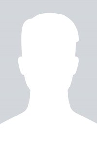 Principal Dr. Rajesh Sharma in formal attire with warm smile and wise expression